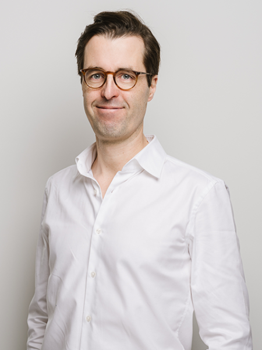 Dr. Tim Schlösser